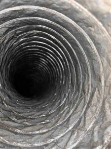 Flexible air duct interior before sanitizing in the Dallas-Fort Worth area