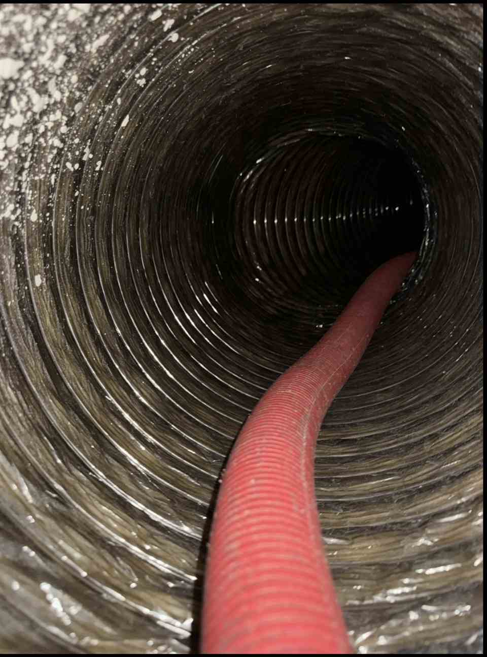 Air Duct Cleaning with an Air Whip in Dallas TX Return air duct being cleaned with an air whip in Dallas, TX