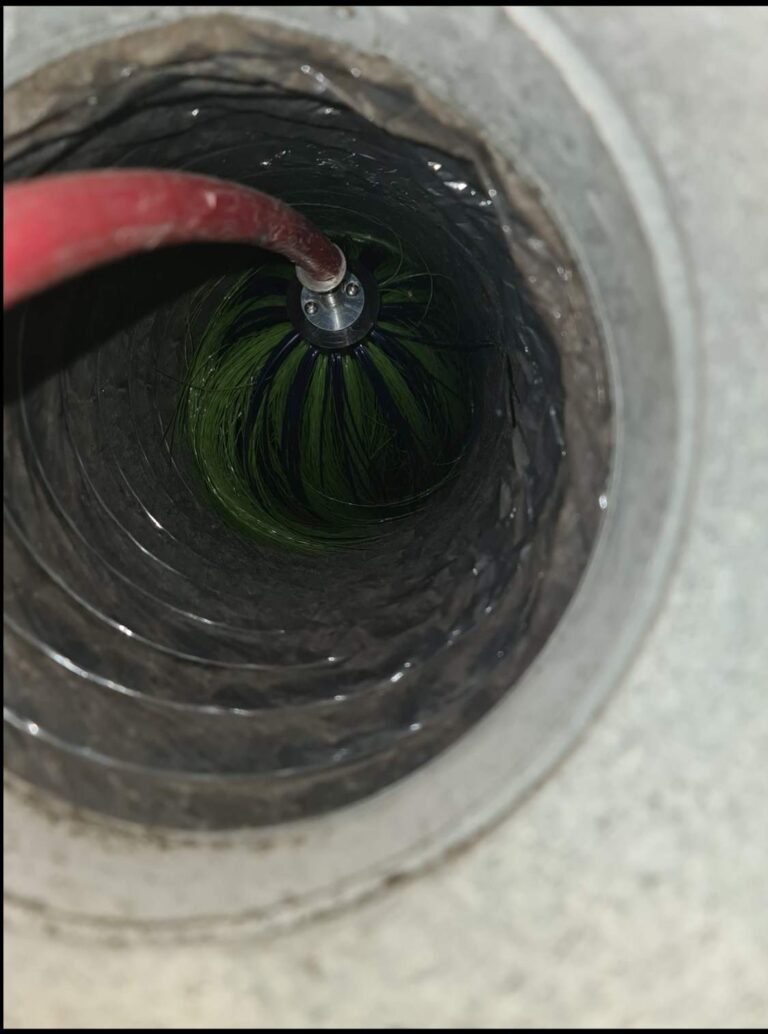 Sanitizing treatment applied inside an air duct in Dallas, TX
