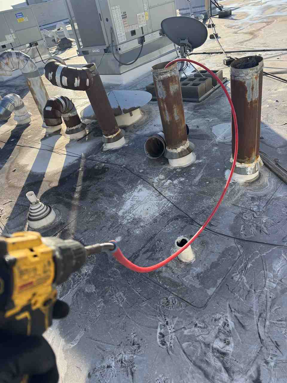 Commercial rooftop dryer vent cleaning in the Dallas-Fort Worth area