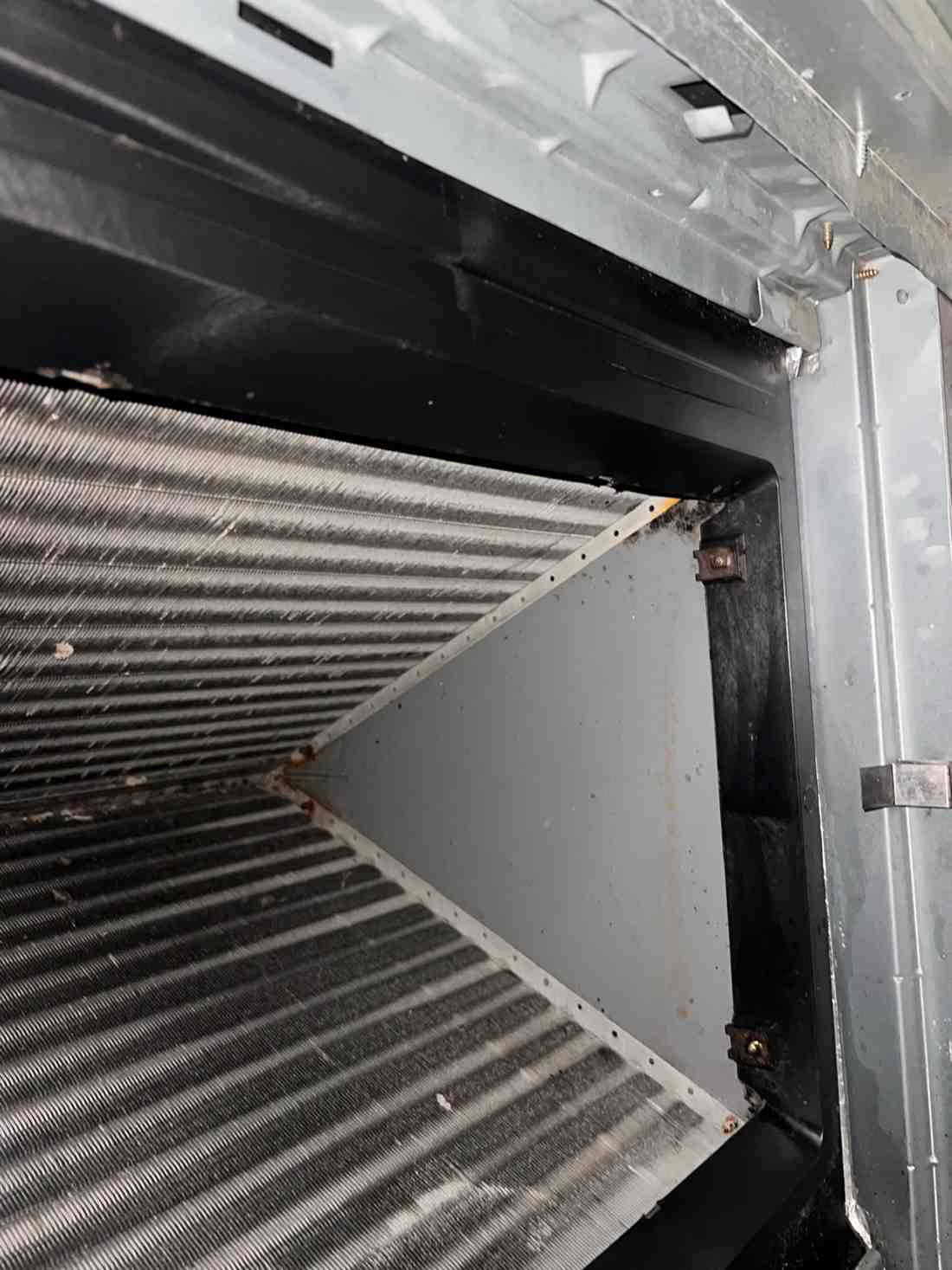 HVAC evaporator coil compartment before cleaning in Dallas, TX