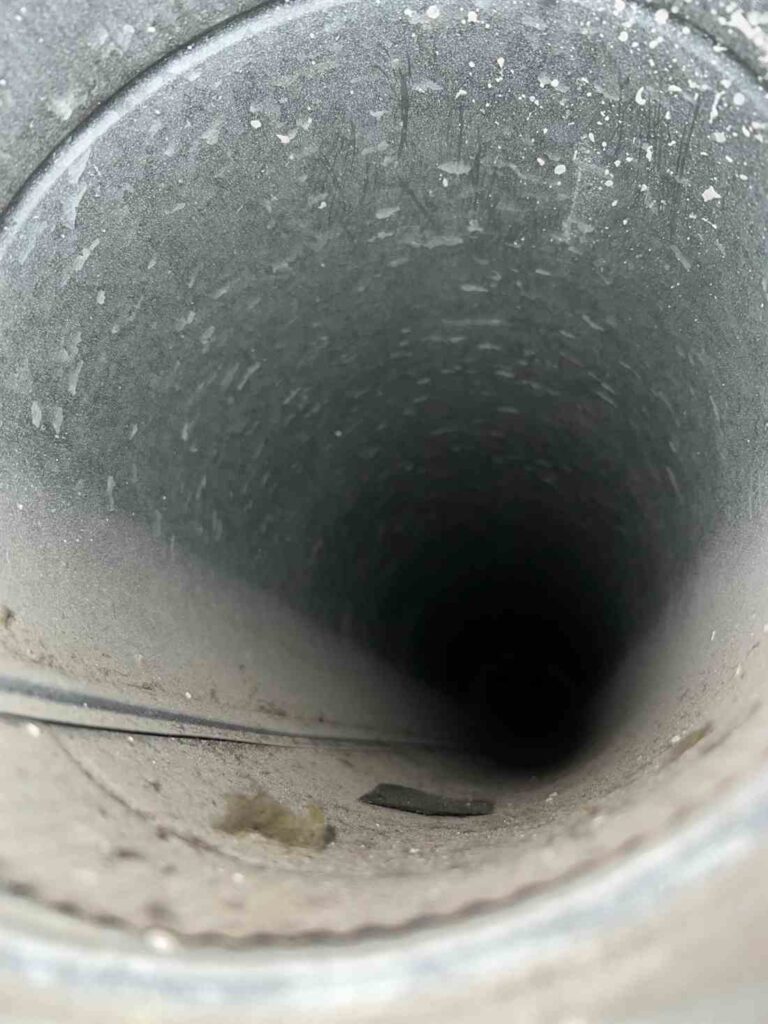 Metal air duct interior inspected during cleaning in Dallas, TX