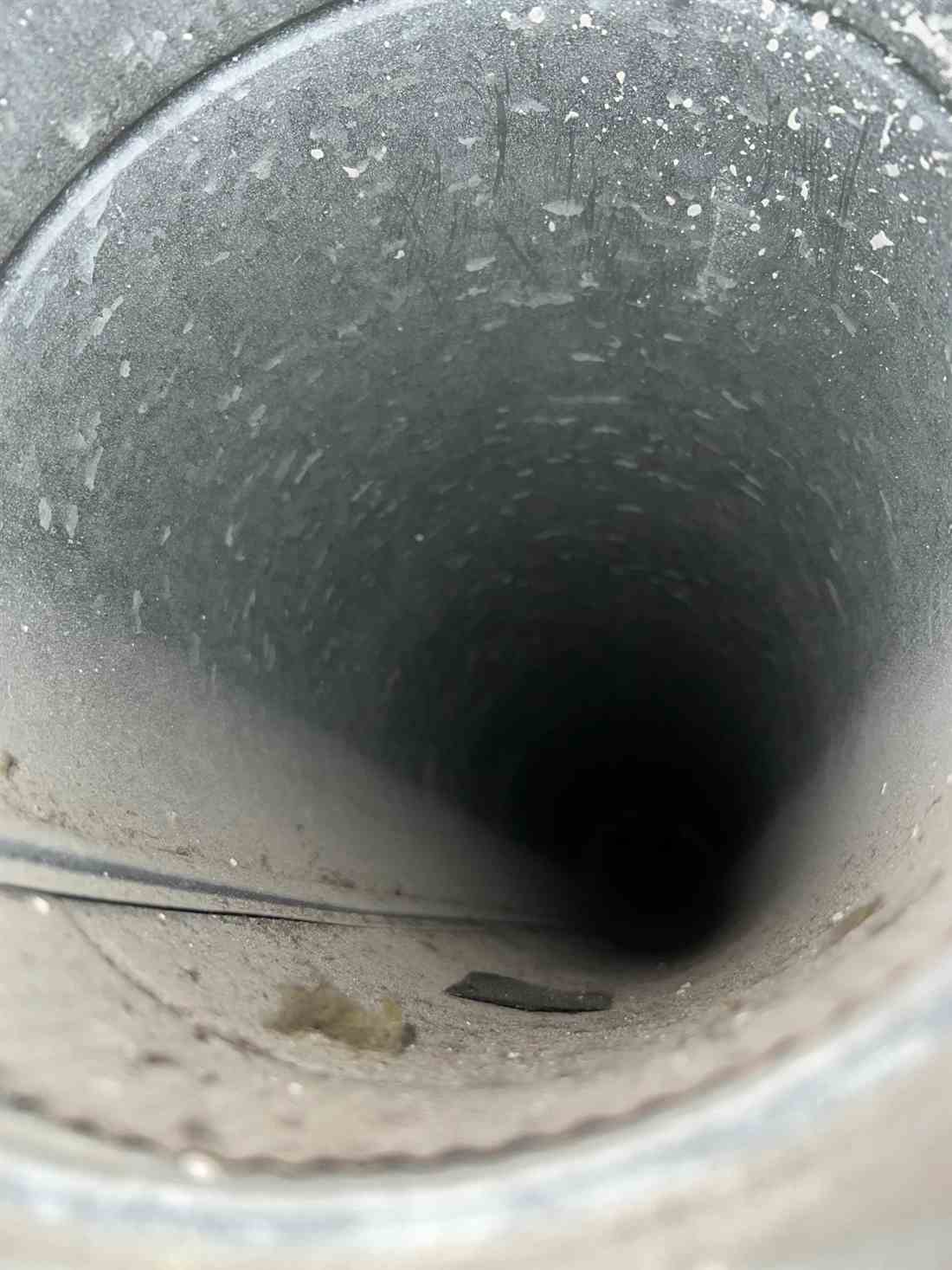Metal air duct interior inspected during cleaning in Dallas, TX