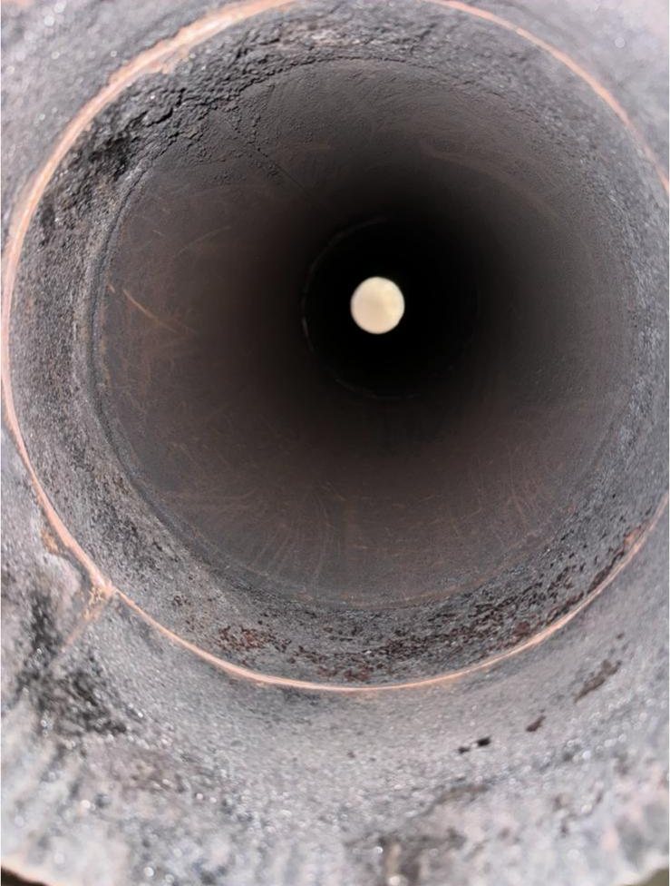 The same chimney flue swept clean of creosote after a professional chimney sweep in Dallas, TX